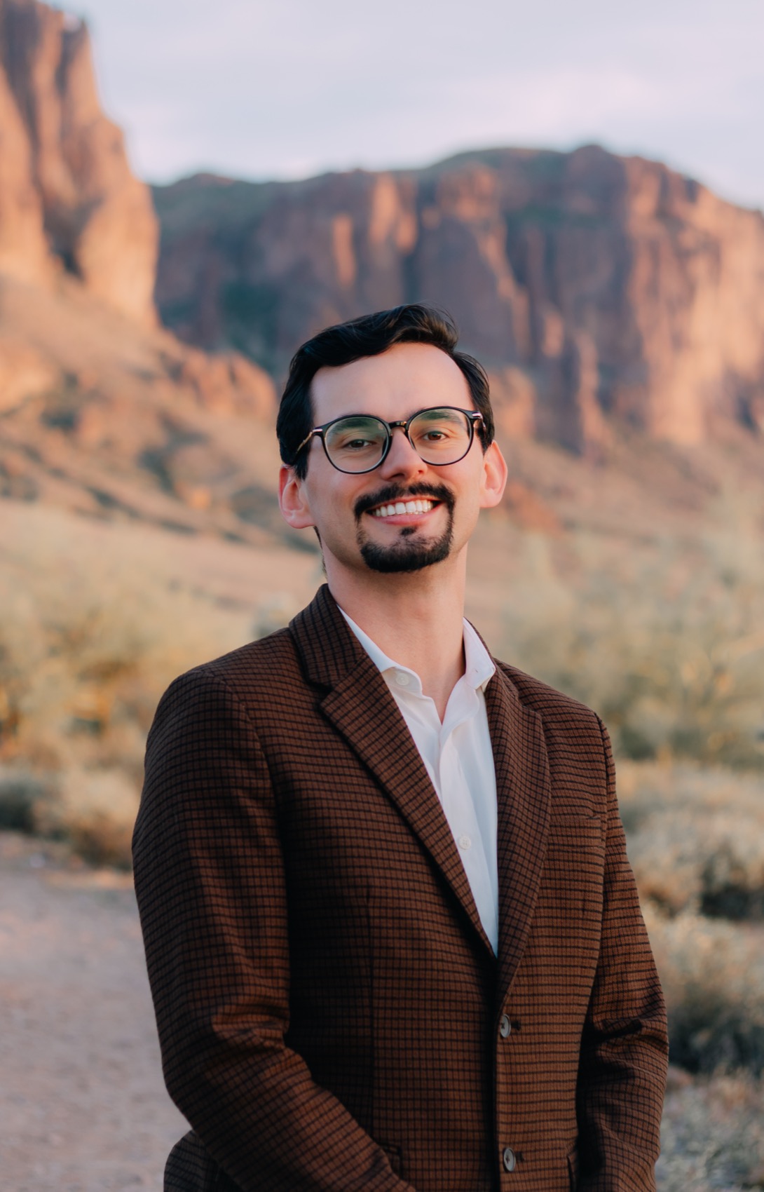 Jake Burt, Mortgage Loan Originator, standing in the Arizona desert